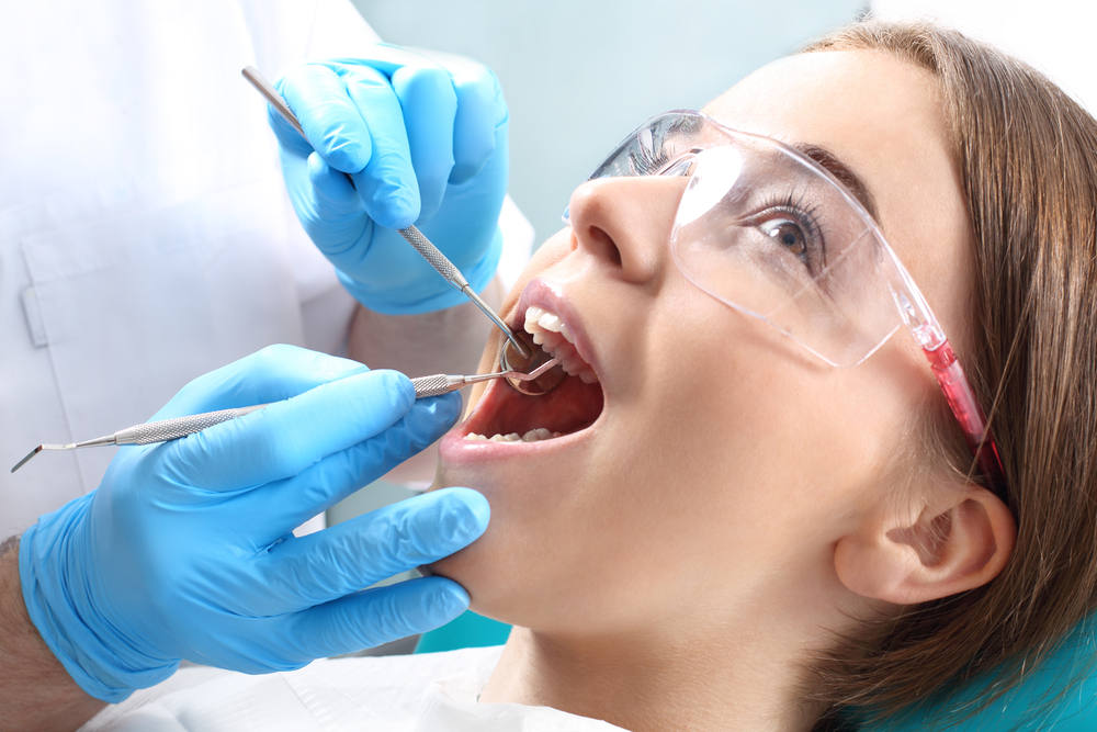 Overview,Of,Dental,Caries,Prevention.woman,At,The,Dentist's,Chair,During
