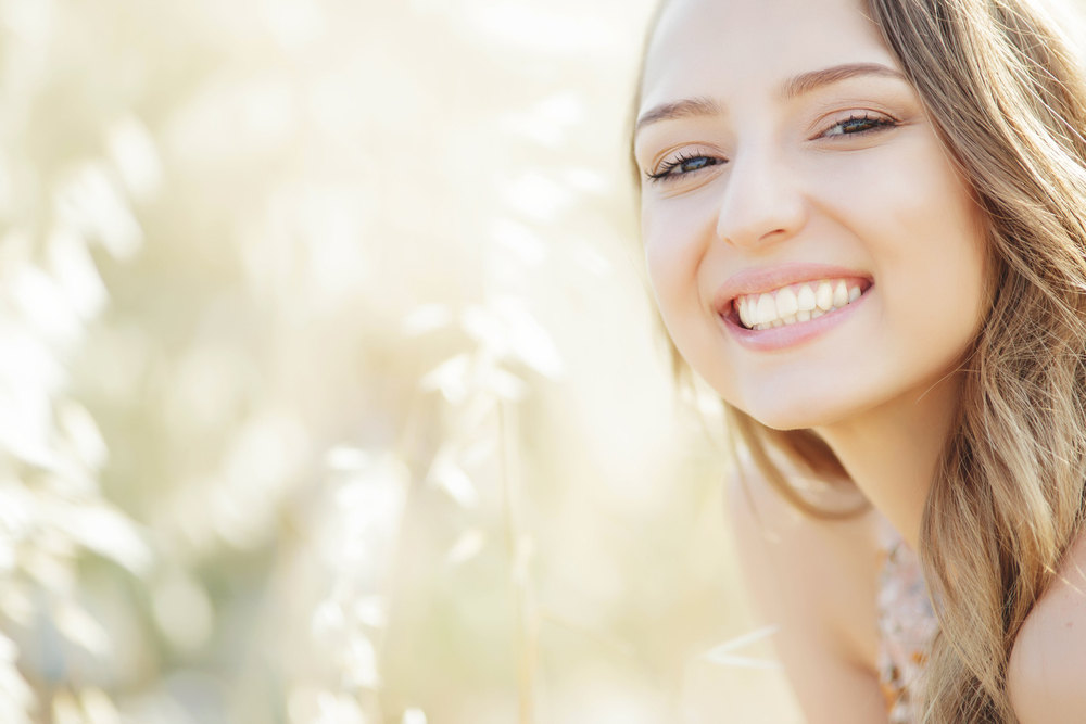 32. Woman smiling (All About Preventive Dental Care)